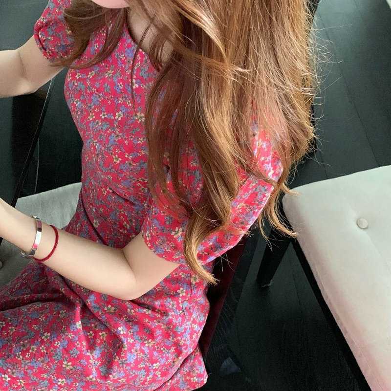 เดรสลายดอกลบมีโบว์ผูกด้านหลัง