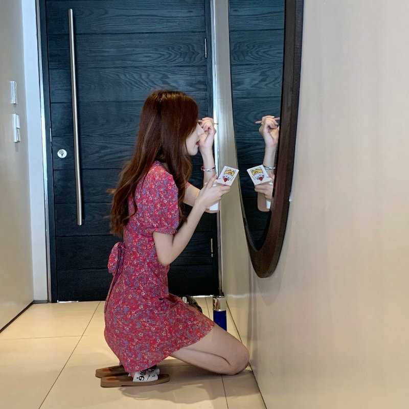 เดรสลายดอกลบมีโบว์ผูกด้านหลัง